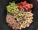 A picture of step 6 of Farro Salad with Chickpeas, Olives, and Walnut Basil Pesto.