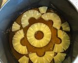 A picture of step 2 of Islands Cake (upside down pineapple, rum and coconut cake).