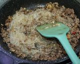 A picture of step 2 of Chinese XO Sauce Minced Pork with vermicelli glass noodles.