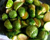 A picture of step 3 of My Roasted Sprouts in orange,crushed Walnuts and Cranberry sauce.