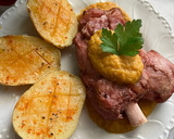 Foto del paso 7 de la receta: Codillo de cerdo con salsa de verduras y patatas asadas