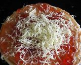 A picture of step 3 of Mix fruit pizza.