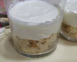 A picture of step 11 of 3 layered Strawberry Cheesecake.