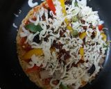 A picture of step 5 of Maggi Pizza.