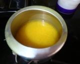 A picture of step 2 of Muri Ghonto (Fish head curry with lentils).