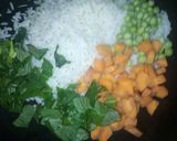 A picture of step 1 of White fried rice with potato and vegetable soup.