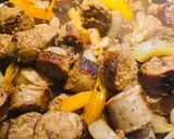 A picture of step 5 of Bratwurst 🌭 with Peppers and Onions 🧅.