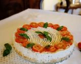 Foto del passaggio 5 della ricetta Cheesecake salata tonno, formaggio e pomodorini