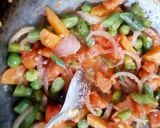 A picture of step 13 of Navratan pulao.