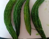A picture of step 1 of Bitter gourd and Onion Subji.