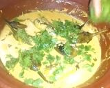 A picture of step 7 of Brinjal Curry in white gravy.