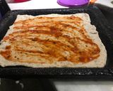 Foto del paso 5 de la receta: Calamardo en alfombra mágica(pizza integral de calamares)