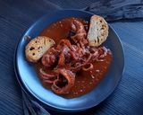 Foto del passaggio 7 della ricetta Moscardini in umido con crostini di pane di farro