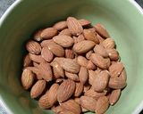 A picture of step 1 of Caramelized Almonds with Sesame and Honey in the Air Fryer.