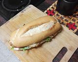 Foto del paso 4 de la receta Bocadillo de merluza frita con lechuga, tomate y mayonesa