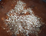 Foto del paso 9 de la receta: Caldereta de cordero con vino tinto, huevo duro y almendras
