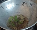 A picture of step 4 of Cucumber,Mint and Lemon grass Koshimbir with Tulsi leaves.