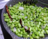 A picture of step 8 of Beans poriyal.