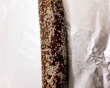 A picture of step 7 of Dates and Dry Fruits Roll.