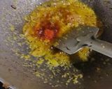 A picture of step 3 of Koi komola, climbing fish curry with orange juice.