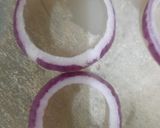 A picture of step 2 of Crispy Baked Onion Rings.