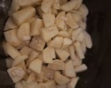 A picture of step 1 of Croc pot mashed potatoes.