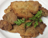 Foto del paso 5 de la receta: Escalopines de cerdo aderezados con ajo y perejil