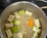 Hình bước làm 4 của món Canh tôm tươi hạt sen bắp non carrot bí đao