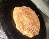 A picture of step 4 of Moong dal chilla.