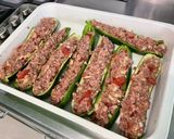 Une image de l'étape 16 de Courgettes et poivrons farcis bœuf, tomates et oignon.