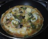A picture of step 7 of Pizza omelette.