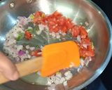 A picture of step 3 of Besan chilla with palak paneer stuffing.