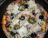 A picture of step 4 of Cheesy paneer pizza.