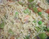 A picture of step 5 of Maggi coins with bowl of veg noodles.