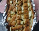 A picture of step 6 of Pull apart garlic bread.