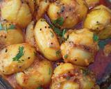 A picture of step 6 of Stuffed Potato Curry (garam masala).