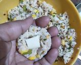 A picture of step 4 of Dhokla in idli version stuffed with cheezee rice patty.