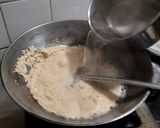 A picture of step 2 of Rava Sheera/Suji Halwa.