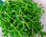 Hình bước làm 1 của món Cháo hến nấm rơm rau đắng