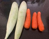 A picture of step 1 of Snakegourd and Carrot Sabji South Indian style.