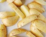A picture of step 1 of Potato wedges.