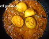 A picture of step 12 of ডিম কষা.
