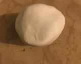 A picture of step 12 of Black and White Conchas 🤍.