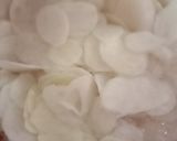 A picture of step 2 of Hand made patato chips.