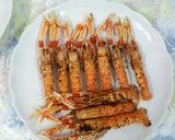 Foto del paso 6 de la receta Almejas con vino blanco ajo, perejil y unas cigalas a la plancha