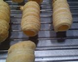 Foto del paso 9 de la receta: Cañoncitos de hojaldre con dulce de leche y pastelera 👩🏼‍🍳