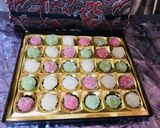 A picture of step 6 of Colourful coconut balls.