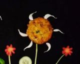A picture of step 8 of Aloo Tiki.