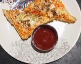A picture of step 6 of Carrot toast with cheese spread.