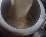 A picture of step 3 of Rajasthani Bajra Khichda (pearl millet).